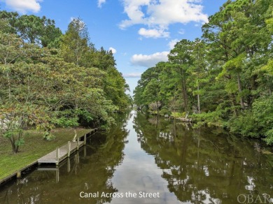 Huge Price Reduction! Fantastic one-level living backing up to on Duck Woods Country Club in North Carolina - for sale on GolfHomes.com, golf home, golf lot