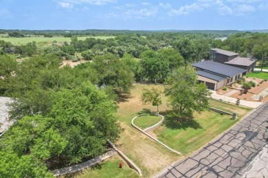This riverfront lot offers an exceptional blend of natural on Pecan Plantation Country Club in Texas - for sale on GolfHomes.com, golf home, golf lot