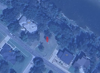 This riverfront lot offers an exceptional blend of natural on Pecan Plantation Country Club in Texas - for sale on GolfHomes.com, golf home, golf lot