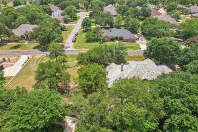 This riverfront lot offers an exceptional blend of natural on Pecan Plantation Country Club in Texas - for sale on GolfHomes.com, golf home, golf lot