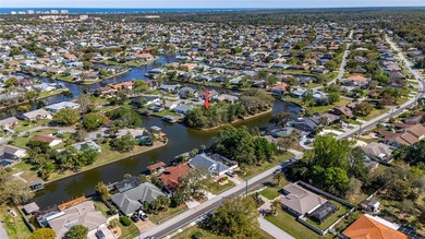 Prime Tip Lot on Saltwater Canal - Build Your Dream Waterfront on Palm Harbor Golf Club in Florida - for sale on GolfHomes.com, golf home, golf lot