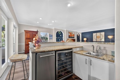 Timeless architecture meets refined modern living in this on Feather Sound Country Club in Florida - for sale on GolfHomes.com, golf home, golf lot