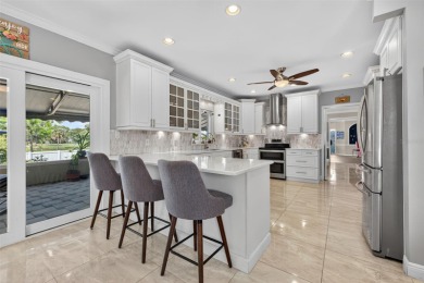 Timeless architecture meets refined modern living in this on Feather Sound Country Club in Florida - for sale on GolfHomes.com, golf home, golf lot