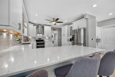 Timeless architecture meets refined modern living in this on Feather Sound Country Club in Florida - for sale on GolfHomes.com, golf home, golf lot
