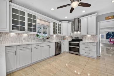 Timeless architecture meets refined modern living in this on Feather Sound Country Club in Florida - for sale on GolfHomes.com, golf home, golf lot