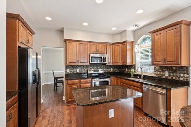 Situated on a premium corner lot backing to the greenway, this on Highland Creek Golf Club in North Carolina - for sale on GolfHomes.com, golf home, golf lot