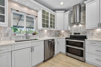 Timeless architecture meets refined modern living in this on Feather Sound Country Club in Florida - for sale on GolfHomes.com, golf home, golf lot