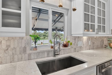 Timeless architecture meets refined modern living in this on Feather Sound Country Club in Florida - for sale on GolfHomes.com, golf home, golf lot