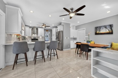 Timeless architecture meets refined modern living in this on Feather Sound Country Club in Florida - for sale on GolfHomes.com, golf home, golf lot