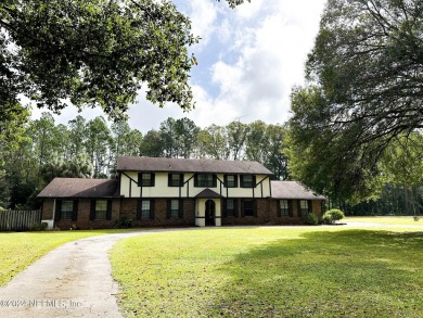 This 3,473 sq ft, two-story brick and stucco home offers four on Starke Golf and Country Club in Florida - for sale on GolfHomes.com, golf home, golf lot