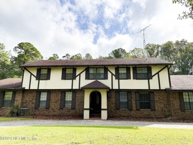 This 3,473 sq ft, two-story brick and stucco home offers four on Starke Golf and Country Club in Florida - for sale on GolfHomes.com, golf home, golf lot