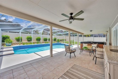 Welcome to this beautifully maintained 4-bedroom, 3-bathroom on Twin Rivers Golf Club in Florida - for sale on GolfHomes.com, golf home, golf lot