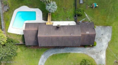 This 3,473 sq ft, two-story brick and stucco home offers four on Starke Golf and Country Club in Florida - for sale on GolfHomes.com, golf home, golf lot