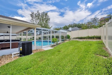 Welcome to this beautifully maintained 4-bedroom, 3-bathroom on Twin Rivers Golf Club in Florida - for sale on GolfHomes.com, golf home, golf lot