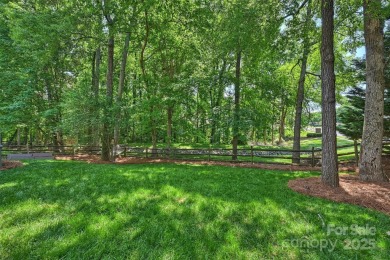 Situated on a premium corner lot backing to the greenway, this on Highland Creek Golf Club in North Carolina - for sale on GolfHomes.com, golf home, golf lot
