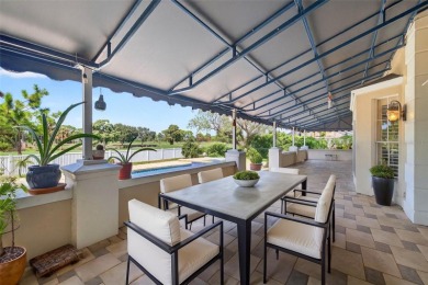 Timeless architecture meets refined modern living in this on Feather Sound Country Club in Florida - for sale on GolfHomes.com, golf home, golf lot