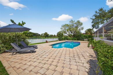 Timeless architecture meets refined modern living in this on Feather Sound Country Club in Florida - for sale on GolfHomes.com, golf home, golf lot