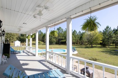 Stunningly remodeled and decorated historic home sitting on on Meadow Links At George T. Bagby in Georgia - for sale on GolfHomes.com, golf home, golf lot