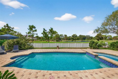 Timeless architecture meets refined modern living in this on Feather Sound Country Club in Florida - for sale on GolfHomes.com, golf home, golf lot