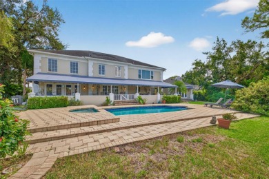 Timeless architecture meets refined modern living in this on Feather Sound Country Club in Florida - for sale on GolfHomes.com, golf home, golf lot