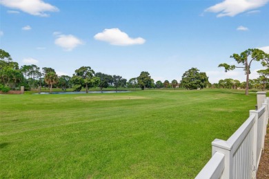 Under contract-accepting backup offers. Timeless architecture on Feather Sound Country Club in Florida - for sale on GolfHomes.com, golf home, golf lot