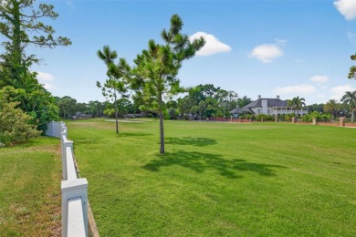 Under contract-accepting backup offers. Timeless architecture on Feather Sound Country Club in Florida - for sale on GolfHomes.com, golf home, golf lot