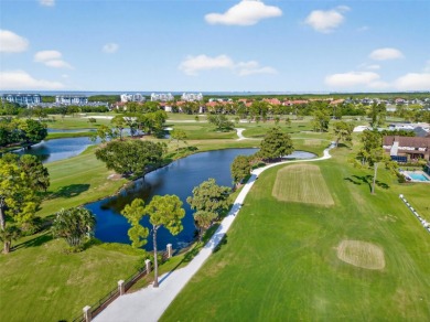 Under contract-accepting backup offers. Timeless architecture on Feather Sound Country Club in Florida - for sale on GolfHomes.com, golf home, golf lot