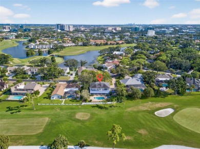 Under contract-accepting backup offers. Timeless architecture on Feather Sound Country Club in Florida - for sale on GolfHomes.com, golf home, golf lot