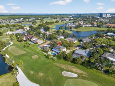 Under contract-accepting backup offers. Timeless architecture on Feather Sound Country Club in Florida - for sale on GolfHomes.com, golf home, golf lot