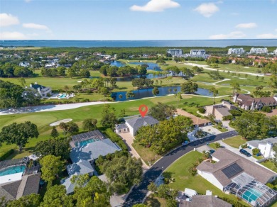 Under contract-accepting backup offers. Timeless architecture on Feather Sound Country Club in Florida - for sale on GolfHomes.com, golf home, golf lot