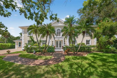 Under contract-accepting backup offers. Timeless architecture on Feather Sound Country Club in Florida - for sale on GolfHomes.com, golf home, golf lot
