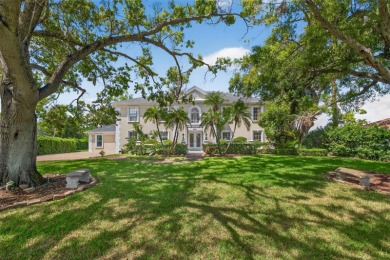 Under contract-accepting backup offers. Timeless architecture on Feather Sound Country Club in Florida - for sale on GolfHomes.com, golf home, golf lot