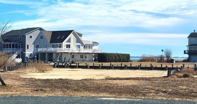 Breathtaking views of the Chincoteague Bay, a front row seat to on Captains Cove Golf and Yacht Club in Virginia - for sale on GolfHomes.com, golf home, golf lot