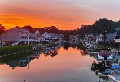 Breathtaking views of the Chincoteague Bay, a front row seat to on Captains Cove Golf and Yacht Club in Virginia - for sale on GolfHomes.com, golf home, golf lot