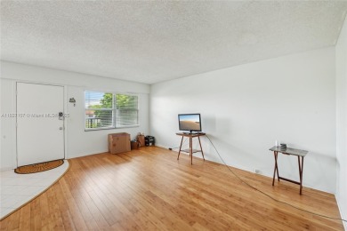 Welcome to this charming 2-bedroom, 1.5-bath condo located in a on Flamingo Lakes Country Club in Florida - for sale on GolfHomes.com, golf home, golf lot