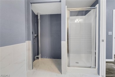 Welcome to this stunningly renovated home in the highly on Kelly Greens Golf and Country Club in Florida - for sale on GolfHomes.com, golf home, golf lot