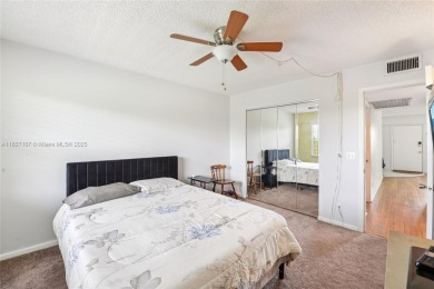 Welcome to this charming 2-bedroom, 1.5-bath condo located in a on Flamingo Lakes Country Club in Florida - for sale on GolfHomes.com, golf home, golf lot
