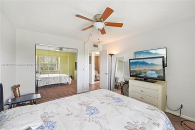 Welcome to this charming 2-bedroom, 1.5-bath condo located in a on Flamingo Lakes Country Club in Florida - for sale on GolfHomes.com, golf home, golf lot