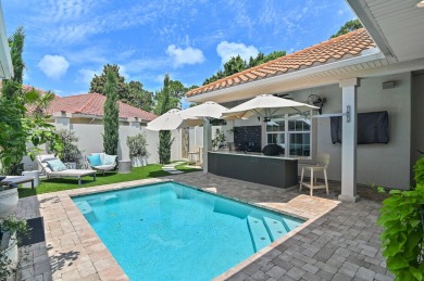 Step into a home that feels like a private resort--where indoor on Regatta Bay Golf and Country Club in Florida - for sale on GolfHomes.com, golf home, golf lot