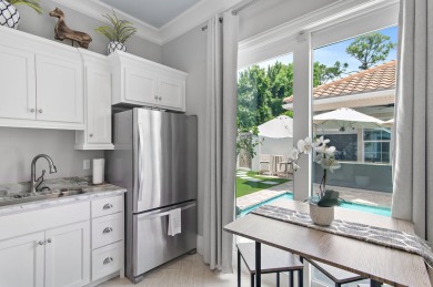 Step into a home that feels like a private resort--where indoor on Regatta Bay Golf and Country Club in Florida - for sale on GolfHomes.com, golf home, golf lot