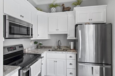 Step into a home that feels like a private resort--where indoor on Regatta Bay Golf and Country Club in Florida - for sale on GolfHomes.com, golf home, golf lot