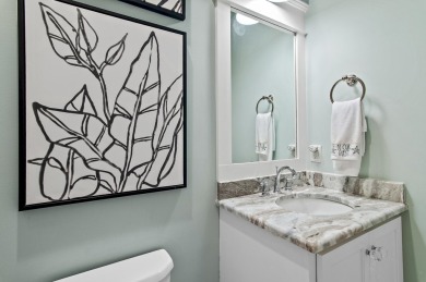 Step into a home that feels like a private resort--where indoor on Regatta Bay Golf and Country Club in Florida - for sale on GolfHomes.com, golf home, golf lot