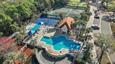 Step into a home that feels like a private resort--where indoor on Regatta Bay Golf and Country Club in Florida - for sale on GolfHomes.com, golf home, golf lot