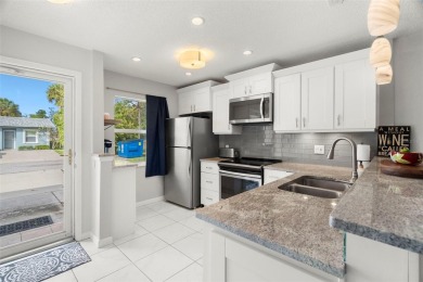 Under contract-accepting backup offers. Beautifully renovated on Seven Springs Golf and Country Club in Florida - for sale on GolfHomes.com, golf home, golf lot