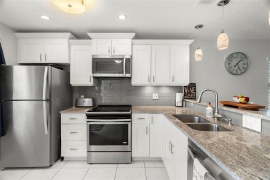 Under contract-accepting backup offers. Beautifully renovated on Seven Springs Golf and Country Club in Florida - for sale on GolfHomes.com, golf home, golf lot