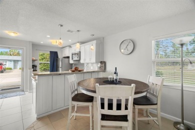 Under contract-accepting backup offers. Beautifully renovated on Seven Springs Golf and Country Club in Florida - for sale on GolfHomes.com, golf home, golf lot