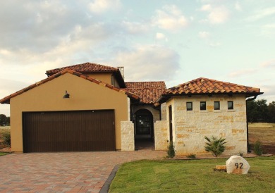 Discover luxury living at its finest with this stunning new on Escondido Golf and Lake Club  in Texas - for sale on GolfHomes.com, golf home, golf lot