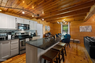 Welcome to Grin and Bear It. This amazing three bedroom, two and on Bent Creek Golf Course in Tennessee - for sale on GolfHomes.com, golf home, golf lot