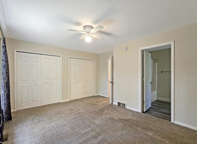 This low-maintenance 3-bedroom, 2-bath home features a bright on Michaywe Pines Course in Michigan - for sale on GolfHomes.com, golf home, golf lot