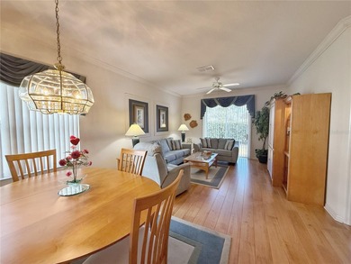 This St. Ives floor plan with screened in LANDSCAPED courtyard on Kings Ridge Golf Club in Florida - for sale on GolfHomes.com, golf home, golf lot